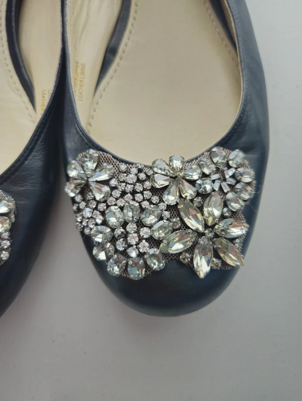 Vera Wang Lavender Black Leather Ballet Flats with Crystal Flower Appliqué
